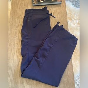 Athleta, size 6, navy joggers.  Adjustable drawstrings at waist and ankles.